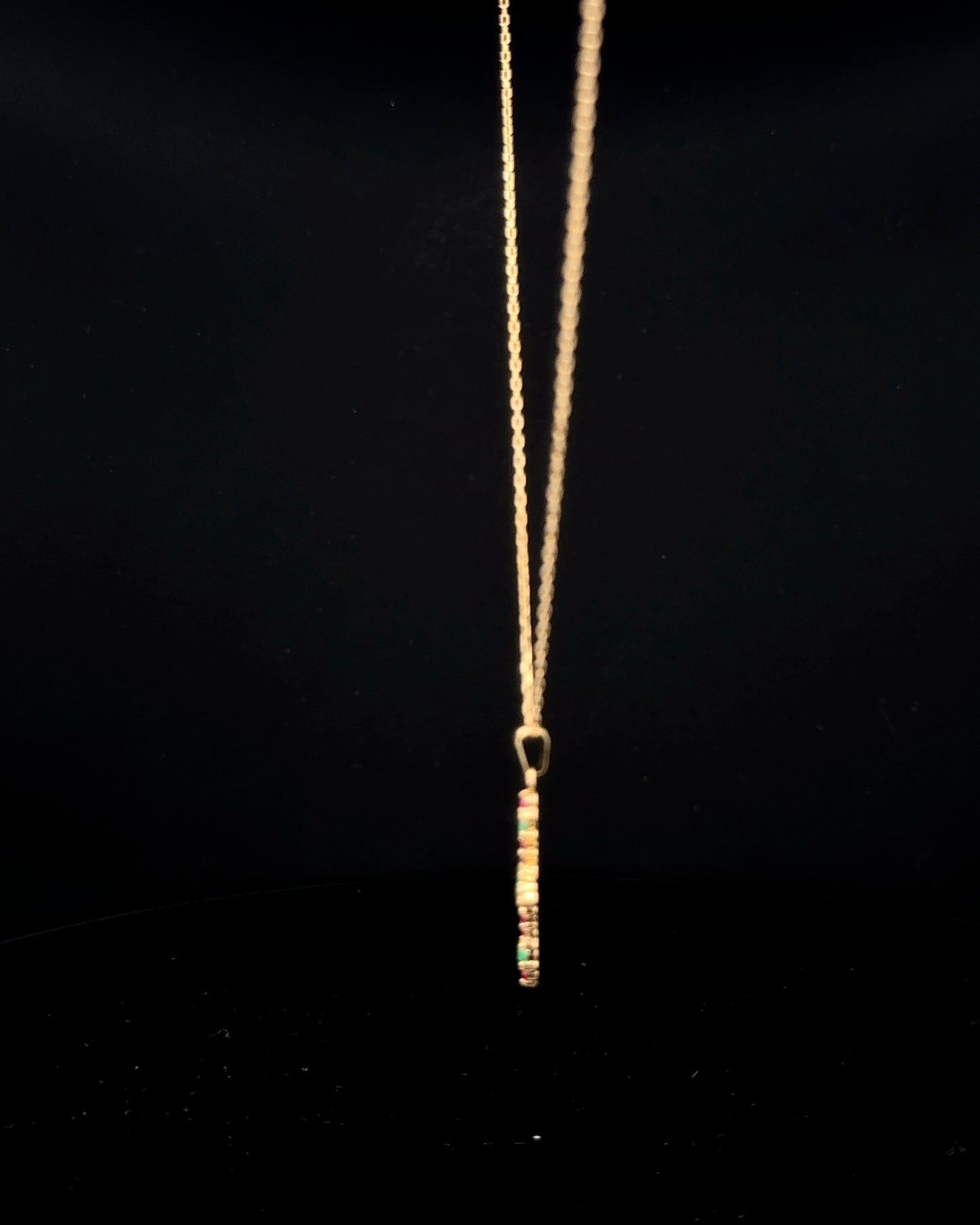 Cadena cruz esmeraldas