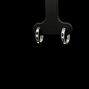Argollas huggie diamante oro blanco