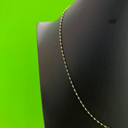 Cadena Mostacilla negra
