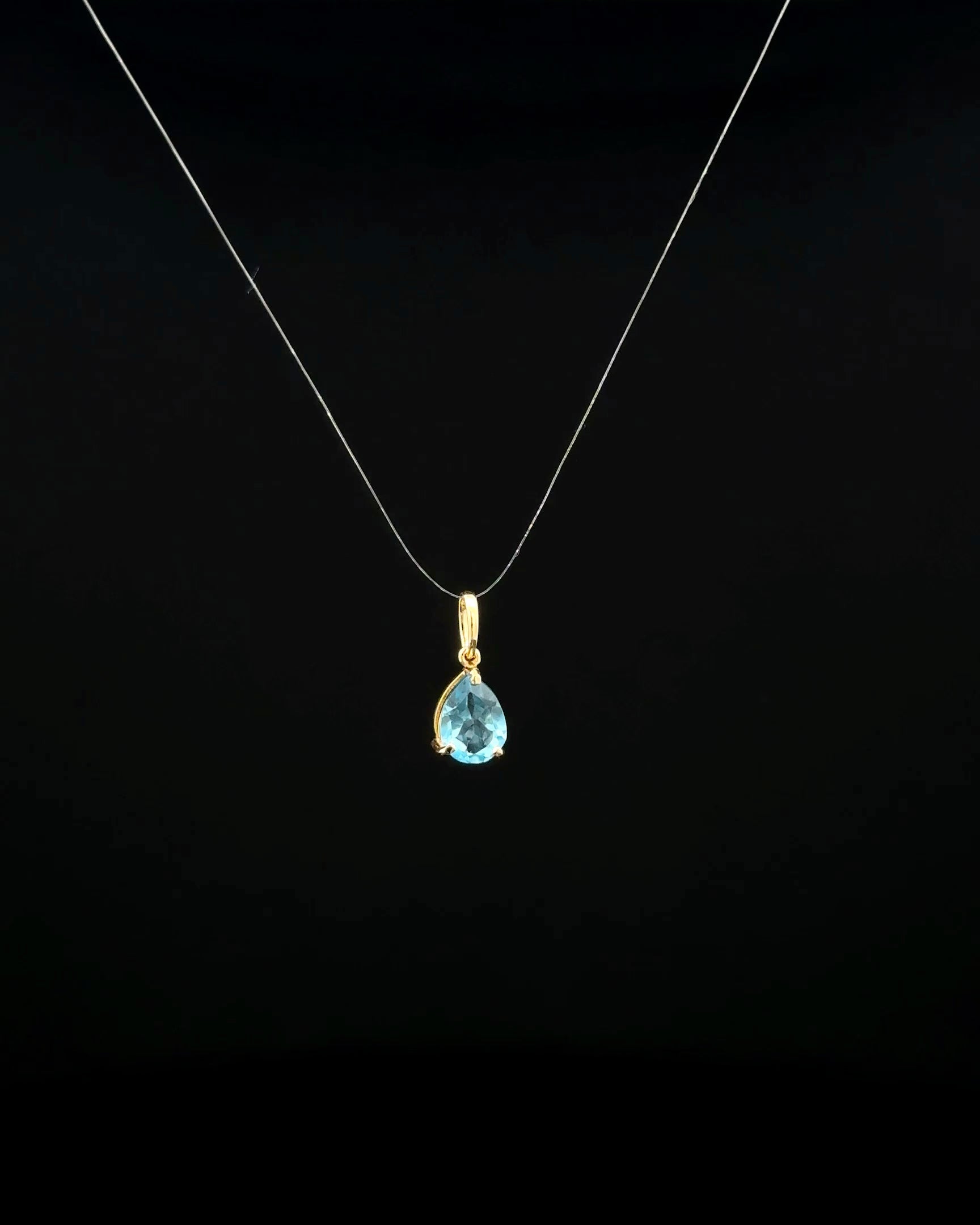 Dije topacio azul