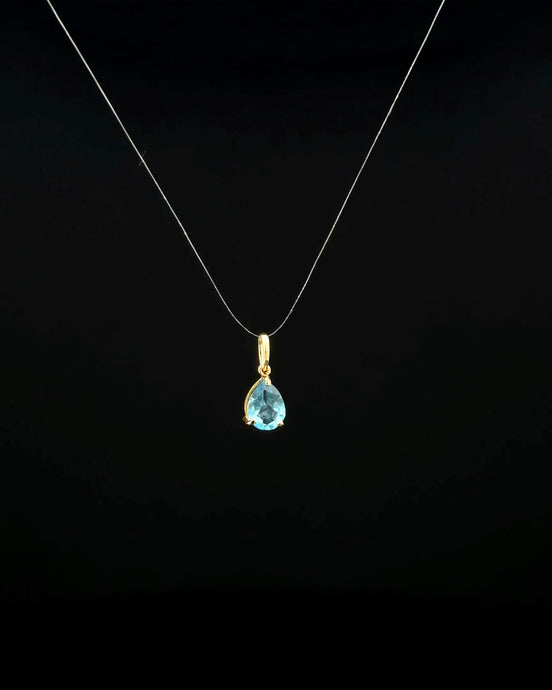 Dije topacio azul