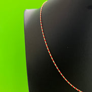 Cadena mostacilla roja