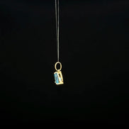 Dije topacio azul