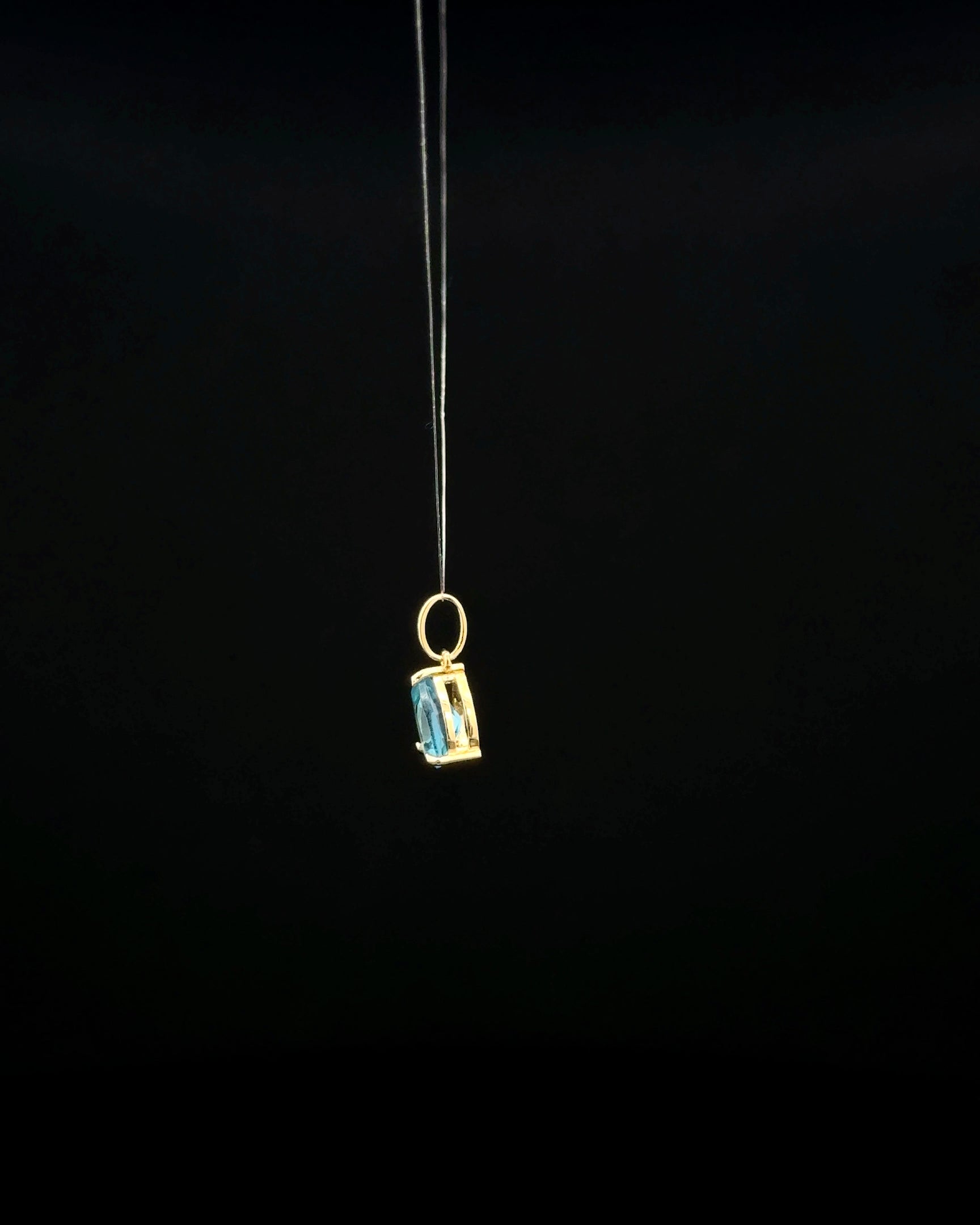 Dije topacio azul