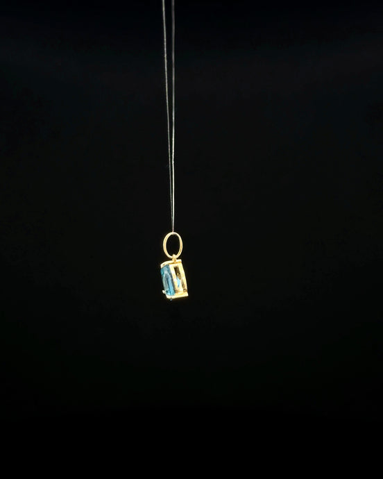 Dije topacio azul