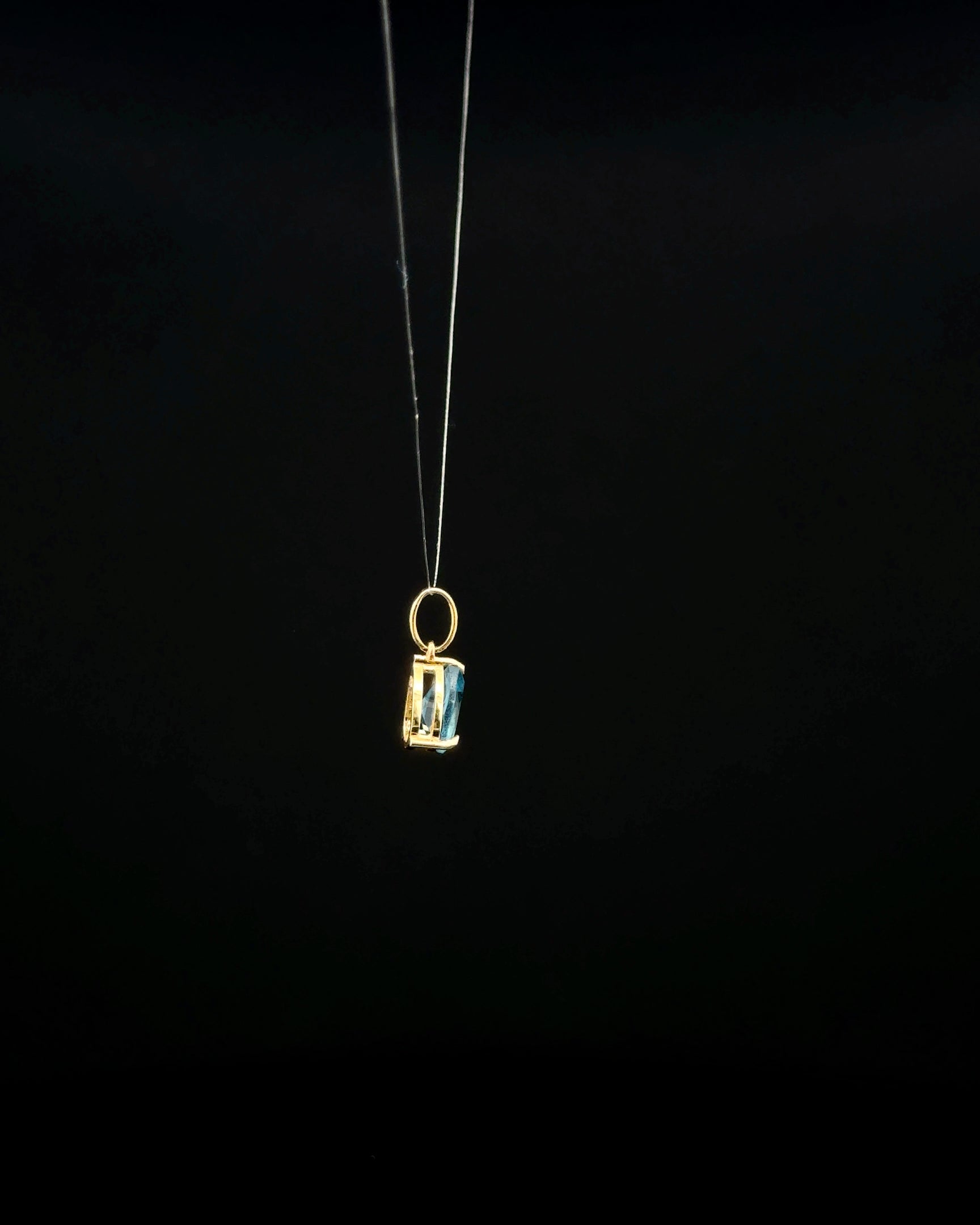 Dije topacio azul