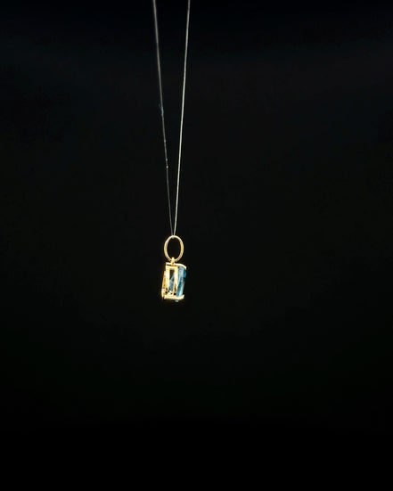 Dije topacio azul